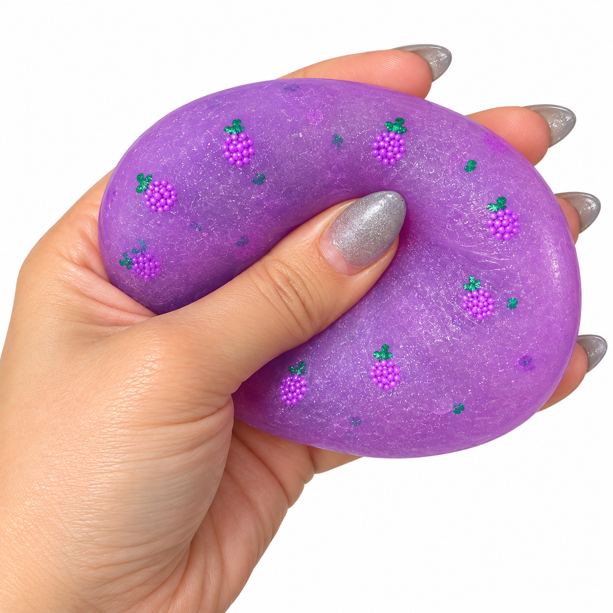 Purple Icy Slushy Ball Squishy sensory squeeze toy held in hand